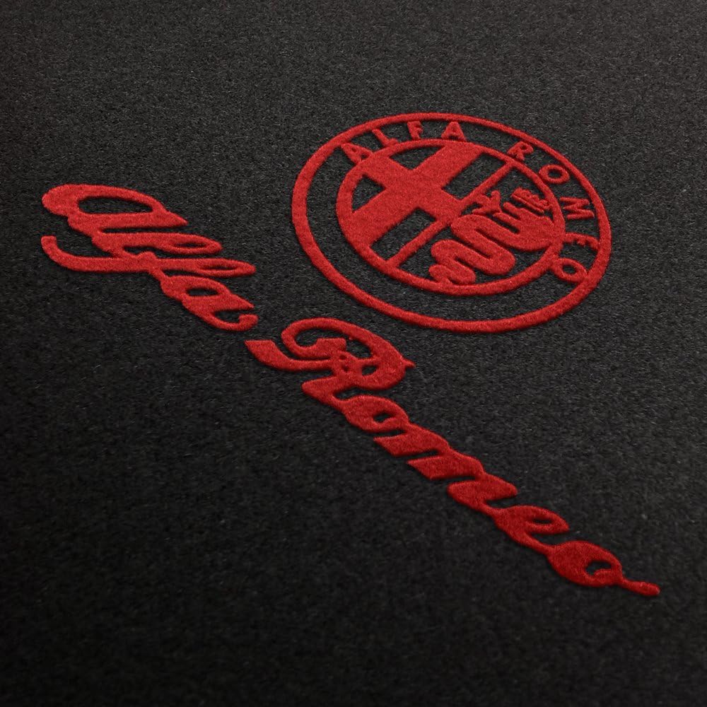Alfa Logo schwarz-rot Eine schwarze Ecke mit Detailaufnahme eines Alfa Logos in rot.
